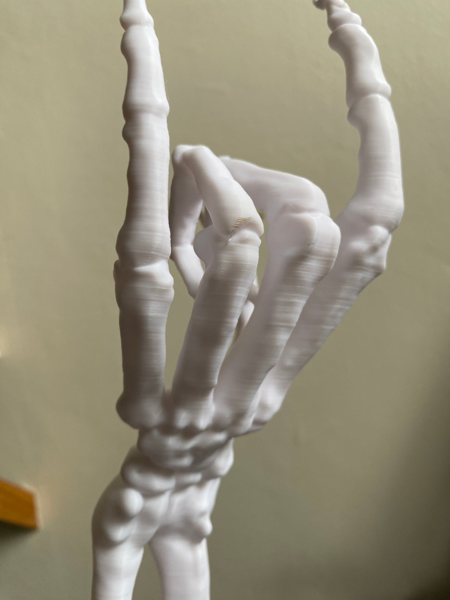 SECONDS #6319 - SKELETON HAND WHITE - SMALL MARKS & LINED TEXTURE