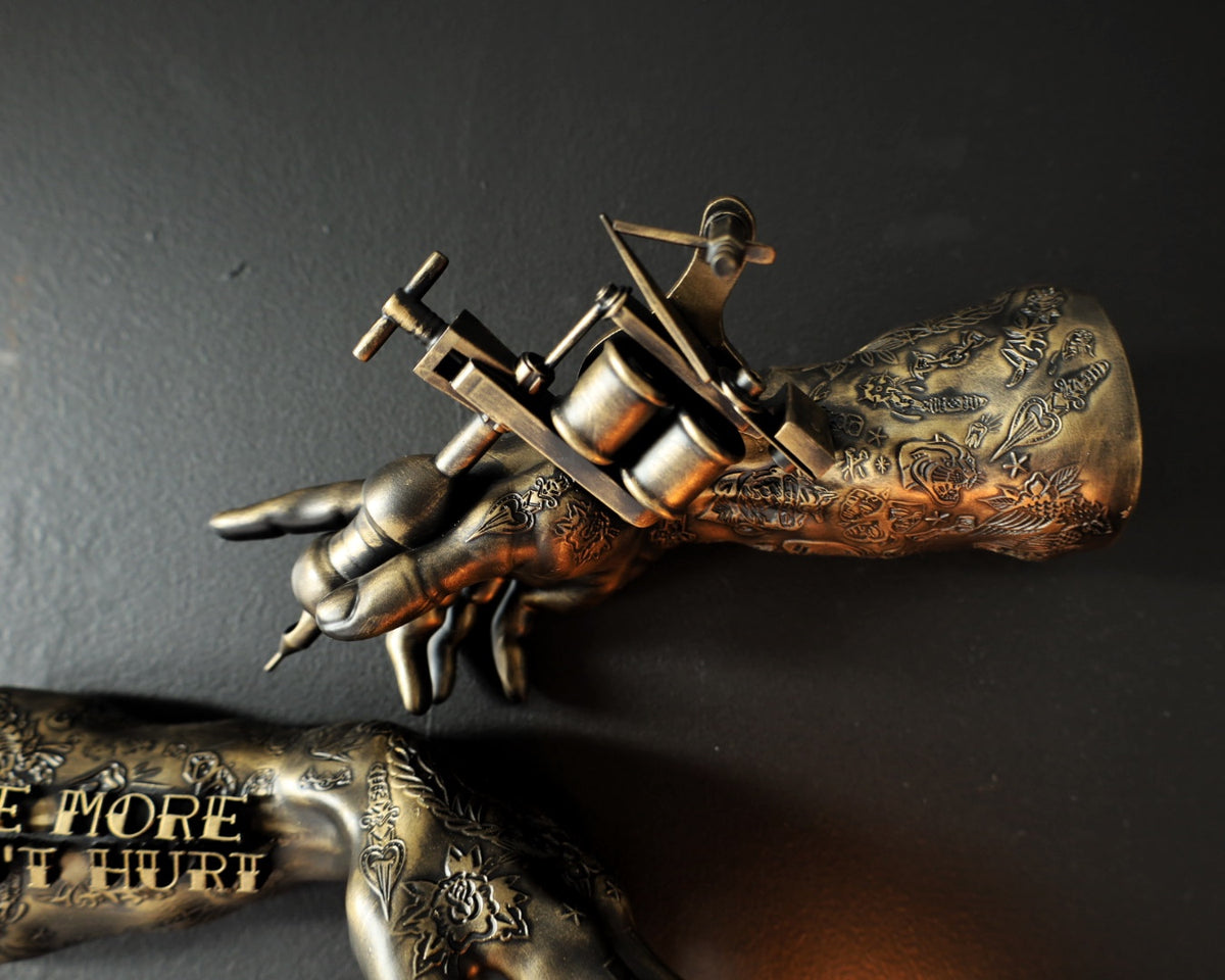 ‘One more won’t hurt’ tattoo arm wall hangings