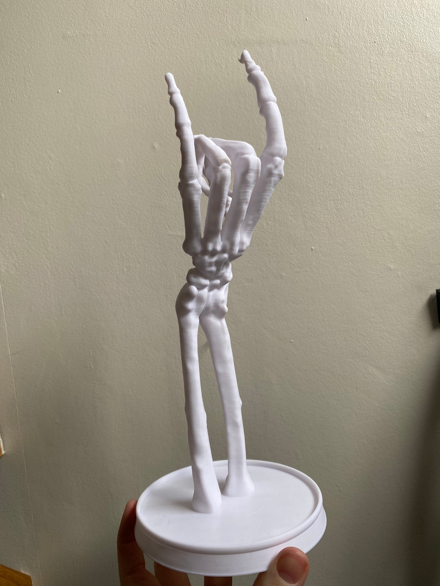 SECONDS #6319 - SKELETON HAND WHITE - SMALL MARKS & LINED TEXTURE