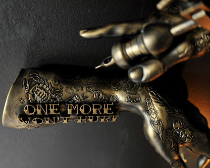 ‘One more won’t hurt’ tattoo arm wall hangings
