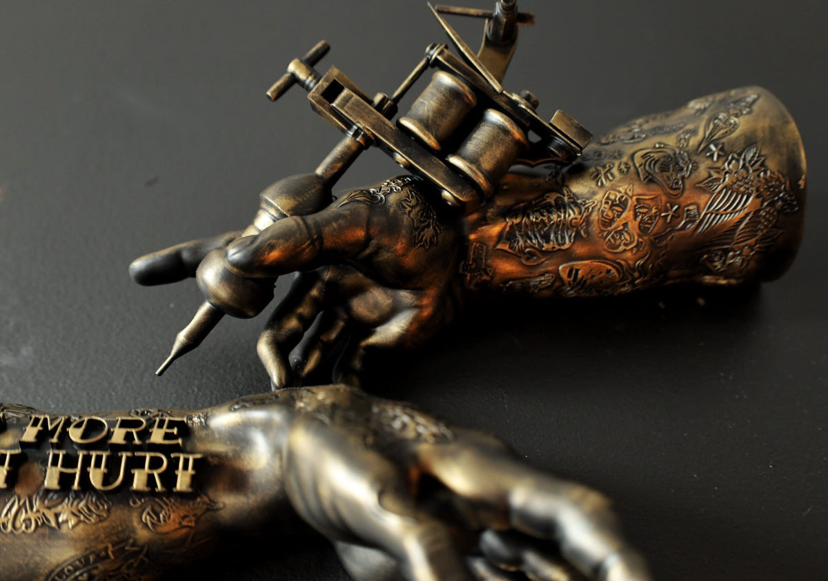 ‘One more won’t hurt’ tattoo arm wall hangings