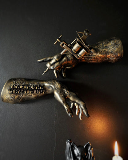 ‘One more won’t hurt’ tattoo arm wall hangings