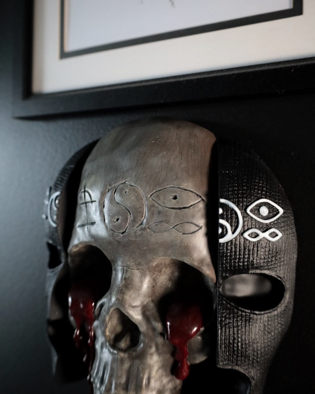 Decorative skull wall art with blood red tears inspired by Bad Omens 