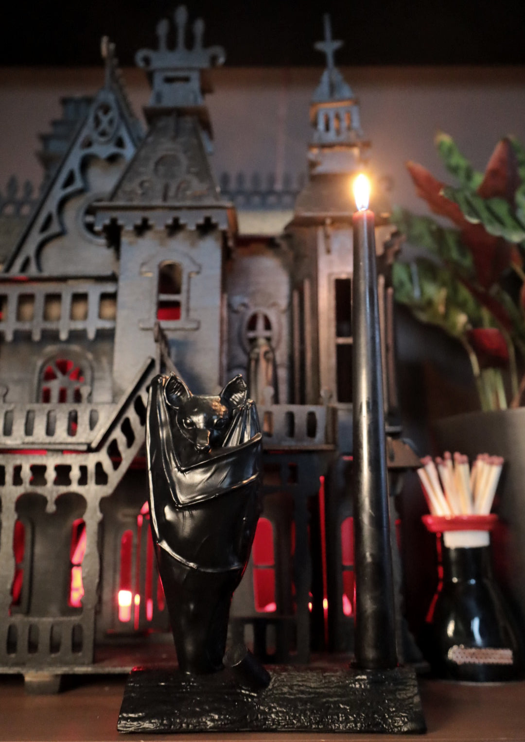 Decorative black bat candle holder to add goth style to your home.
