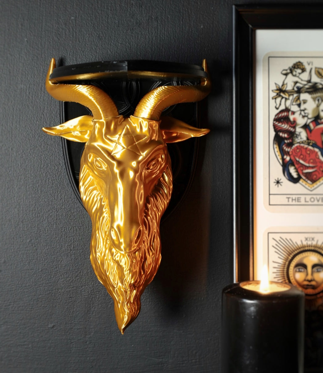 Black and gold wall art featuring Baphomet goat head 