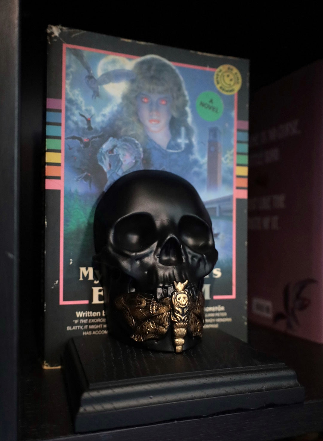Death moth skull bookend for your gothic bookshelf in black and gold