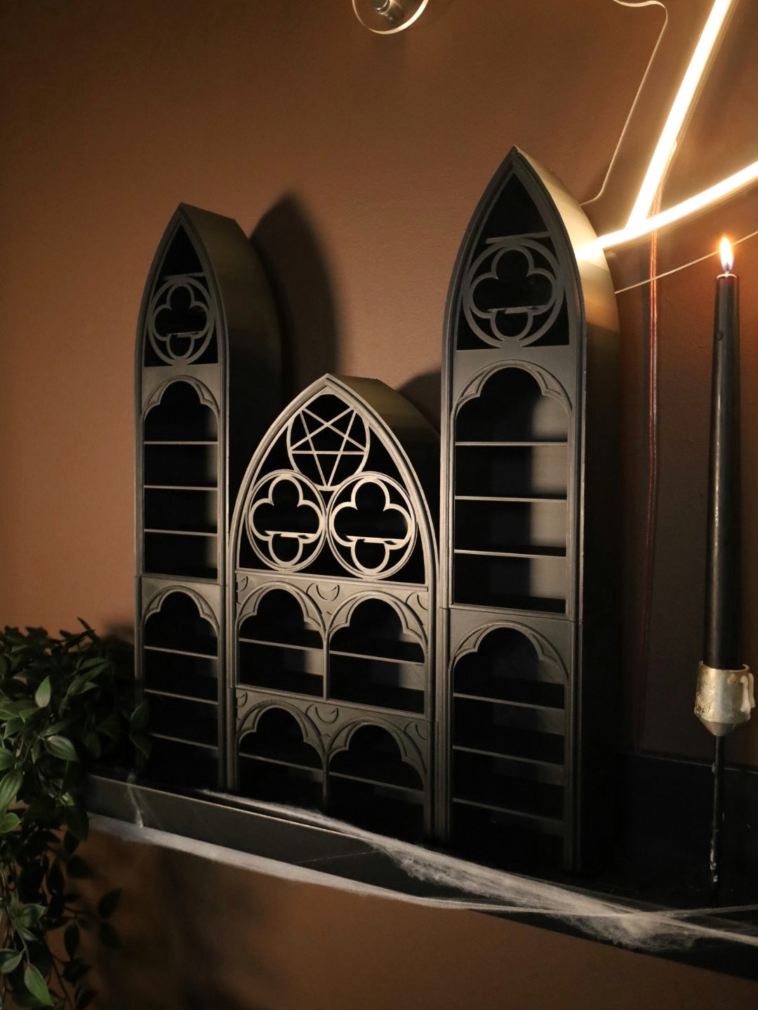 Gothic black shelves with a Victorian gothic home decor feel 