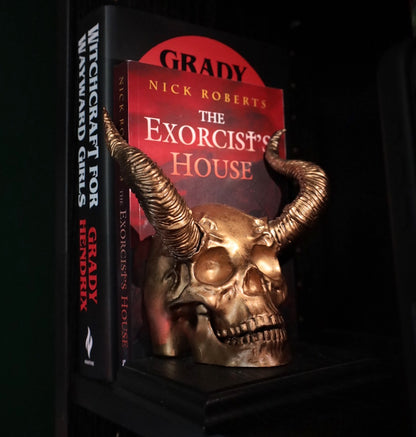 Gothic horned skull bookend to add goth style to your bookshelf