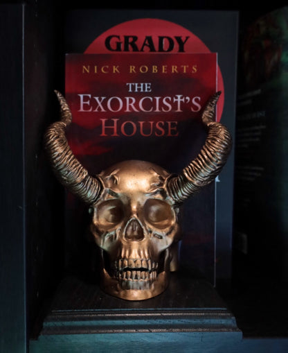 Black and gold skull bookend to add edge to your alt aesthetic