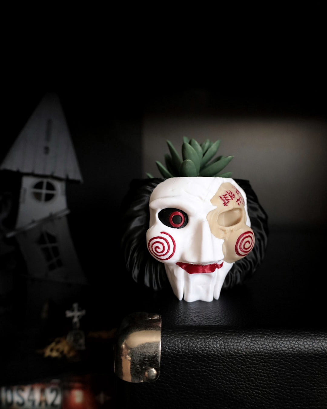 Jigsaw plant pot inspired by horror movie Saw. Halloween horror home decor