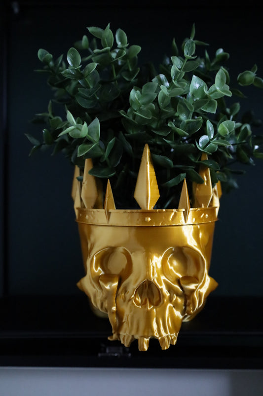 Skull decor planter with tears and crown. Would make a great gift for goths.