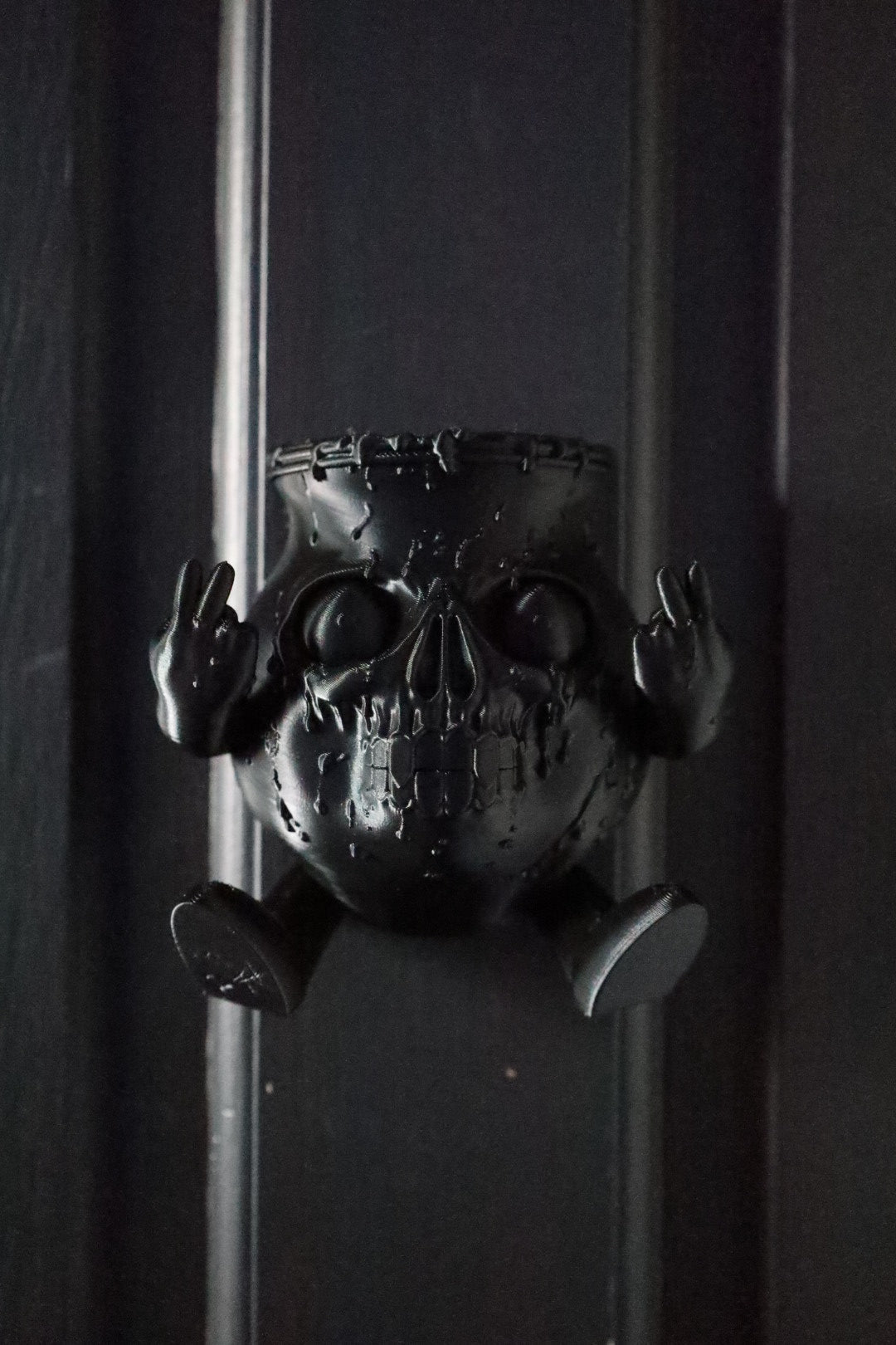 A decorative wall hanging featuring a stylized skull Kool aid inspired by Bring Me The Horizon’s Kool Aid song 
