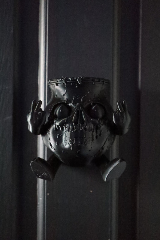 A decorative wall hanging featuring a stylized skull Kool aid inspired by Bring Me The Horizon’s Kool Aid song 