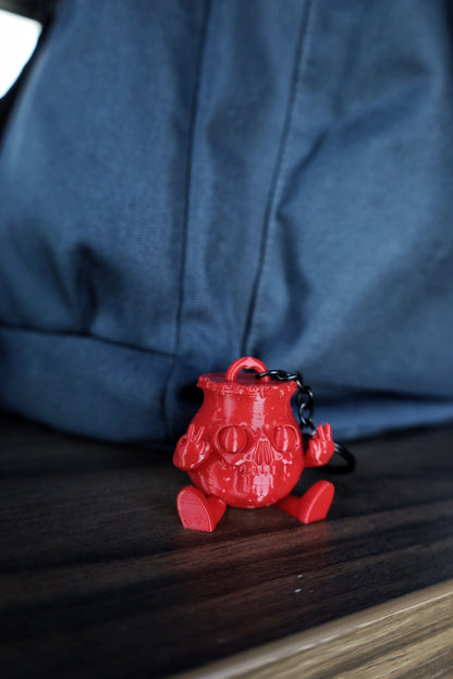A 3D printed red Kool-Aid man keyring with a gothic design inspired by bring me the horizon