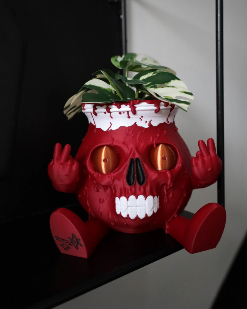 Red skull shaped Kool aid man planter inspired by bring me the horizon 