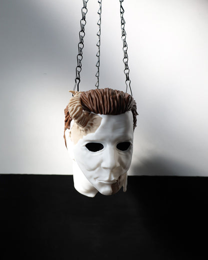 Michael Myers hanging planter inspired by the slasher horror film Halloween. Horror gifts