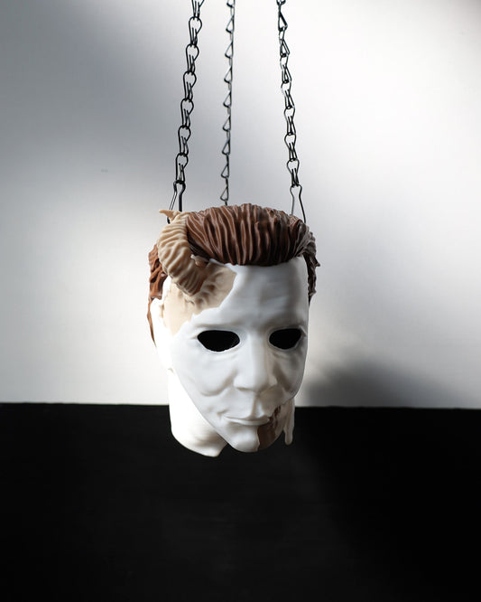 Michael Myers hanging planter inspired by the slasher horror film Halloween. Horror gifts