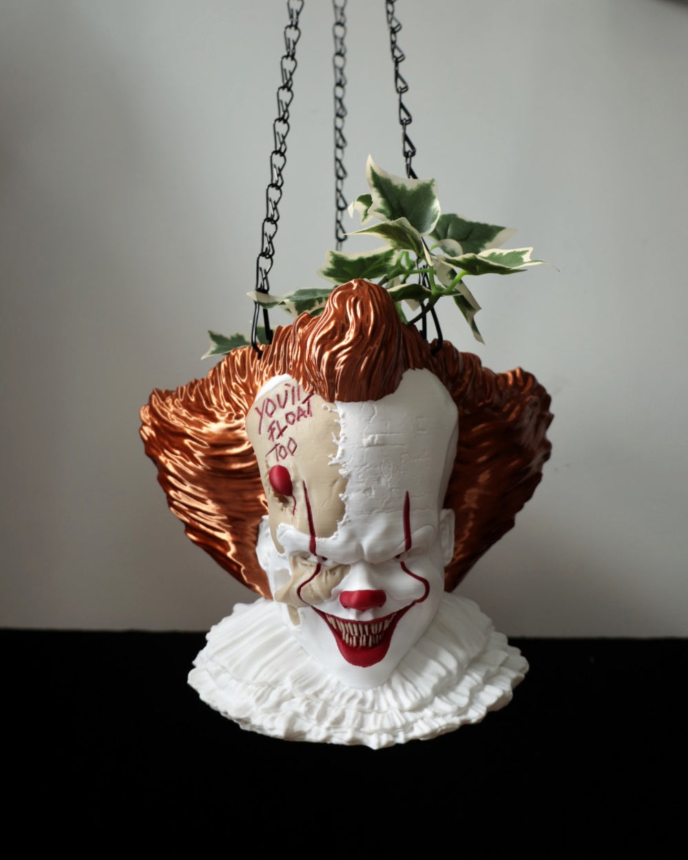 Pennywise plant pot inspired by stephen king's horror movie IT. Great horror home decor