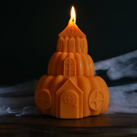 Pumpkin House Halloween Candle to add a little whimsigoth to your bedroom