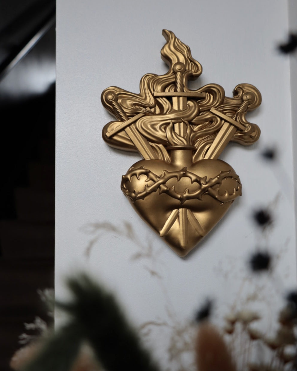 Gothic gold wall art heart with swords and flames design 