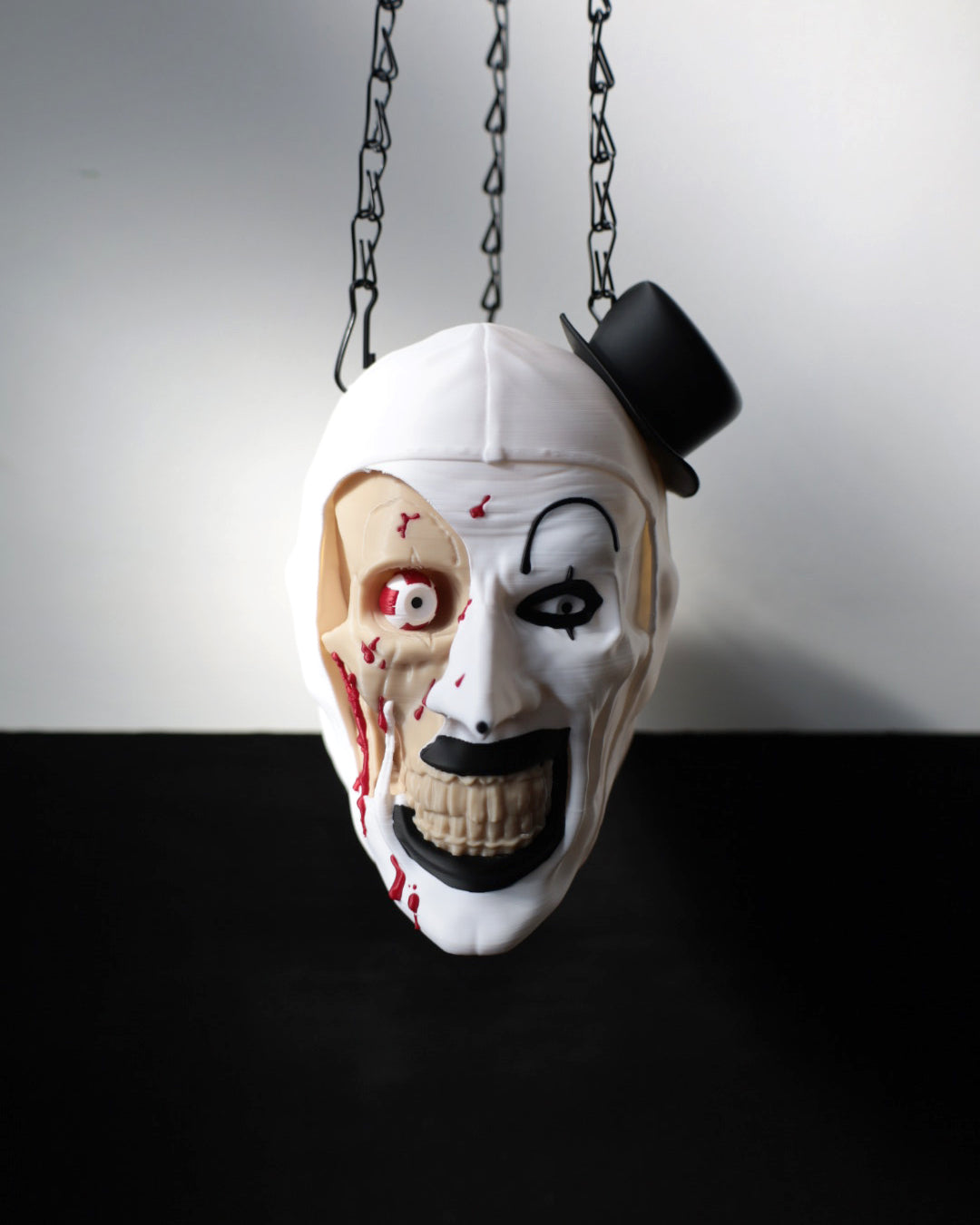 Art The Clown character from the horror movie Terrifier. Would make a great creepy Halloween decoration