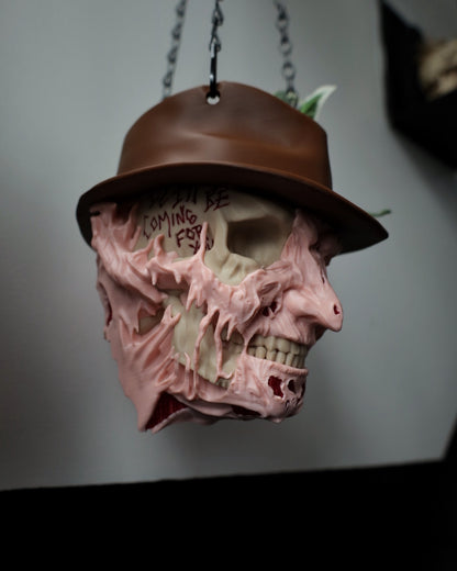 Hanging planter of freddy kruegers head from the horror classic nightmare on elm street. Horror gifts