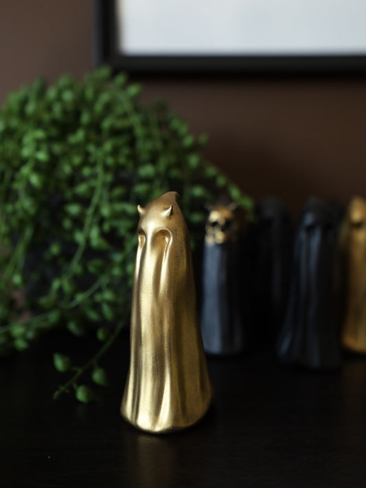 Gold ghost ornament with devil horns. Gothic home decor perfect for ghost collectors