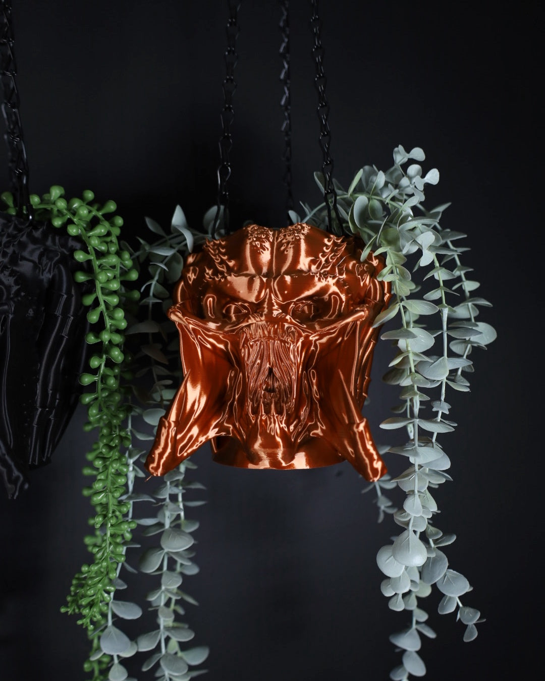 copper hanging planter of the yautja alien warrior from the horror predator film