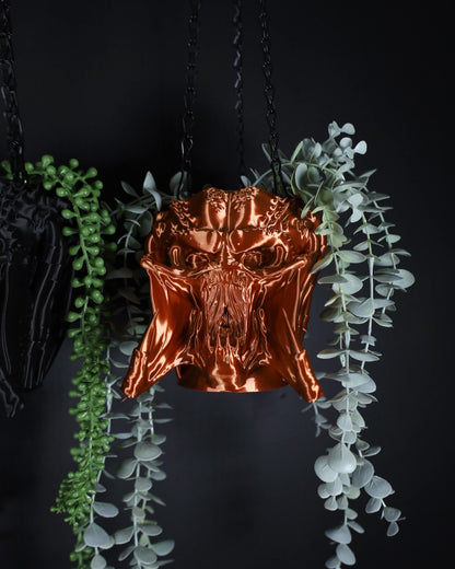copper hanging planter of the yautja alien warrior from the horror predator film