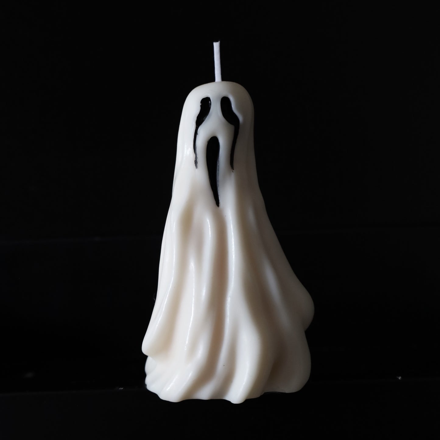 Ghost soy wax candle for cute Halloween decor.