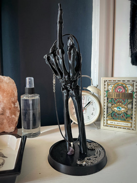 Skeleton hand jewellery stand made for gothic home decor.