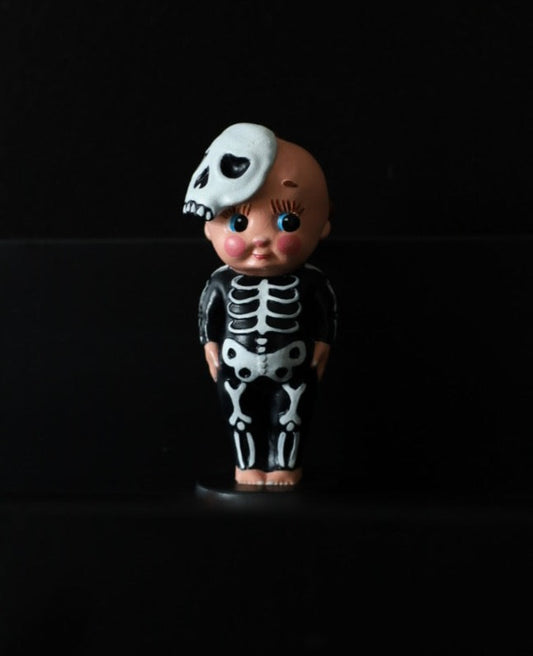 Hand painted skeleton kewpie vintage style ornament perfect for your creepy cute Halloween decorations.