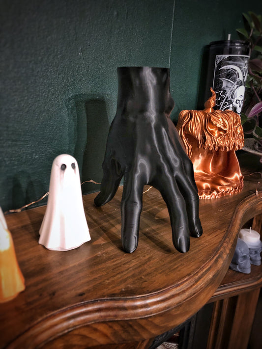 Thing hand ornament from the spooky Halloween film The Addams Family. Gothic home decor